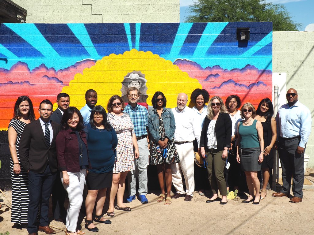 NLC's 2018 Equitable Economic Development felloship team standing outside mural in Phoenix, Arizona